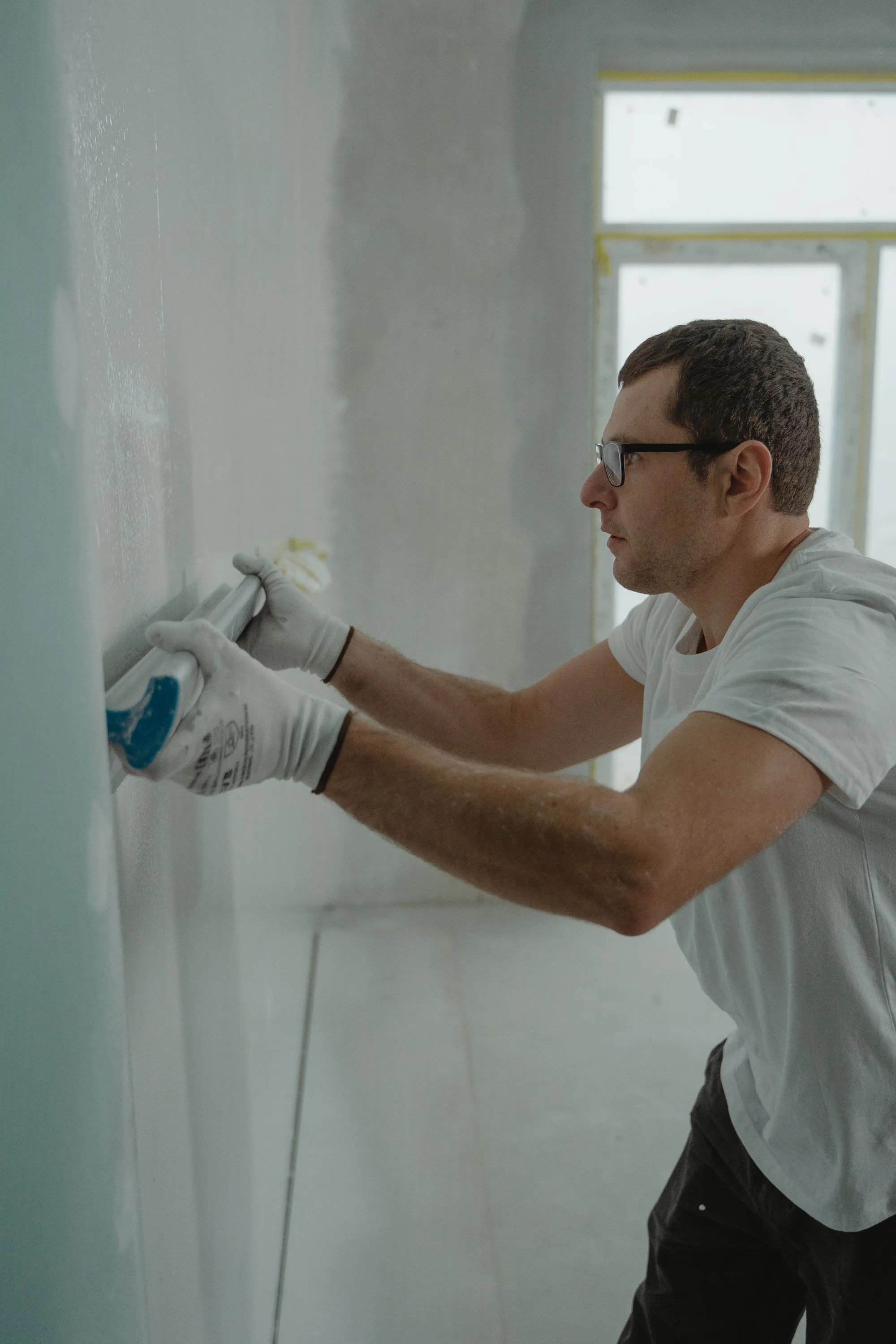 Applying joint compound to an interior wall